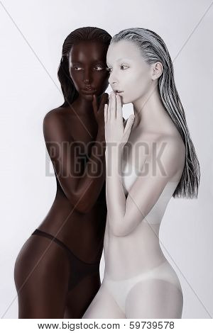 Ethnicity. Fantasy. Futuristic Women Painted White And Black. Art Bodypainting