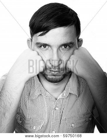 portrait of man thinking deeply in black and white