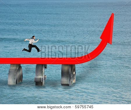 Businessman Running On Red Trend Arrow Bridge