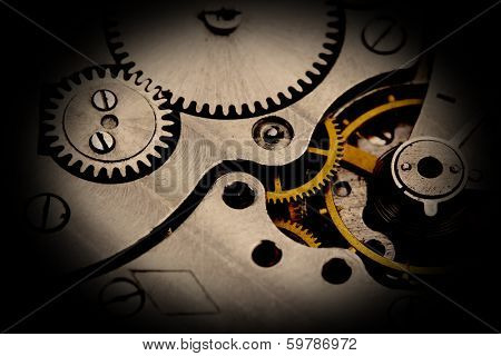 Clockwork details, pinions and wheels closeup