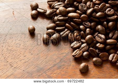Coffee Beans On Wood Background