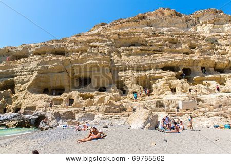 Pebbly Beach Matala, Greece Crete. Matala Has Become Famous For Artificial  Neolithic Caves, Carved