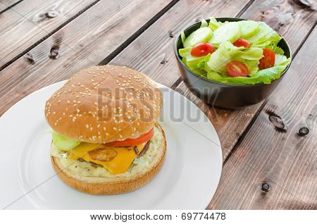 Cheeseburger With Bacon And Tartar Sauce And Garden Salad
