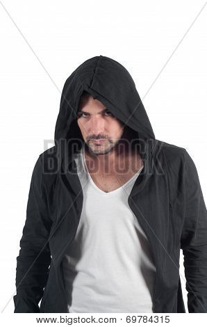 Portrait of a young angry male in the hood