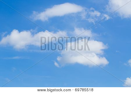 Clouds In The Blue Sky .