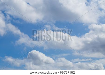 blue sky background with tiny clouds