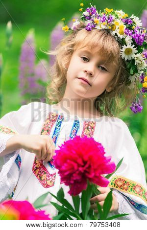 child in flowers
