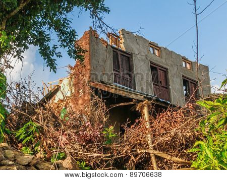 KOT DANDA, LALITPUR, NEPAL - MAY 2, 2015: Damaged house after the 7.8 earthquake that hit Nepal on April 25, 2015.