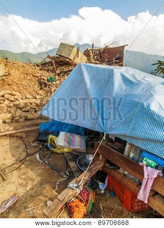 KOT DANDA, LALITPUR, NEPAL - MAY 2, 2015: Damaged house after the 7.8 earthquake that hit Nepal on April 25, 2015.