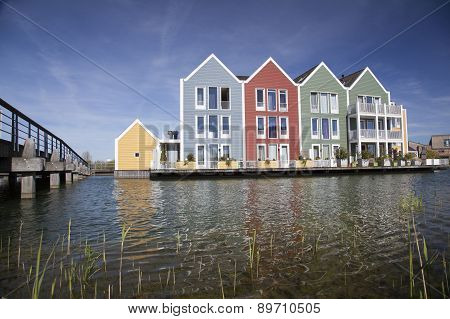 Floating Wooden Houses In The Neighbourhood Rietveld In The Dutch Town Of Houten
