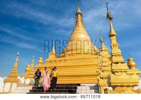 Burmese People And Buddhist Monk Visiting Sandamuni Pagoda. Mandalay. Myanmar (burma)