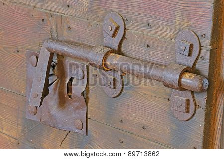 Lock With Big Deadbolt To Close The Door Of The Castle