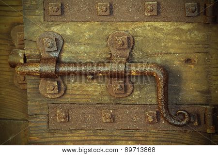 Old Lock With Big Deadbolt To Close The Door Of The Castle