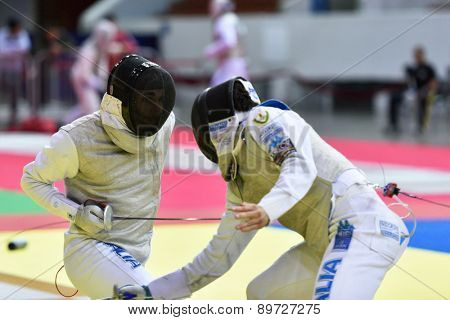 ST. PETERSBURG, RUSSIA - MAY 2, 2015: Daniele Garozzo of Italy (left) vs Giorgio Avola of Italy in the quarterfinal of International fencing tournament St. Petersburg Foil, the stage of FIE World Cup