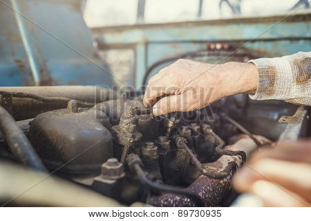 Senior farmer on a tractor
