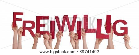 People Holding Red Word Freiwillig Means Voluntary