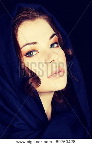 Young beautiful woman wearing headkerchief