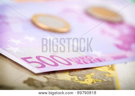 Closeup Of Euro Banknotes And Coins