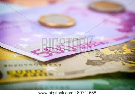 Closeup Of Euro Banknotes And Coins