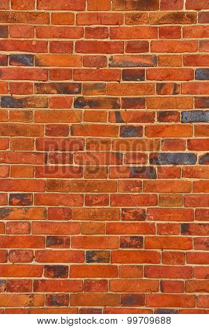 Wall Of Orange Cracked Bricks As Background Or Texture