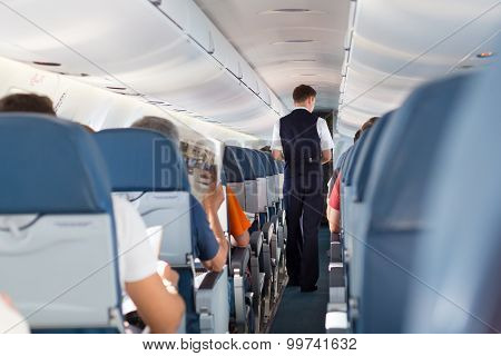 Steward on the airplane.