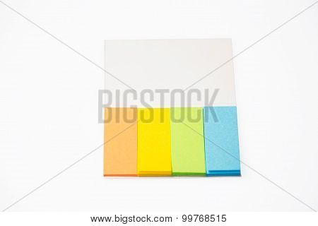 photo of colorful notepads on white background