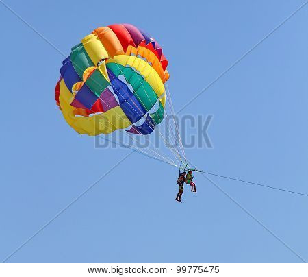 Parasailing In A Blue Sky