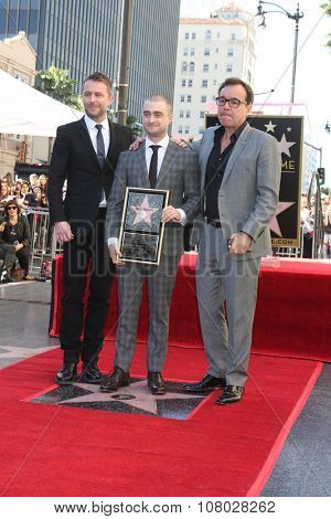 LOS ANGELES - NOV 12:  Chris Hardwick, Daniel Radcliffe, Chris Columbus at the Daniel Radcliffe Hollywood Walk of Fame Ceremony at the Hollywood Walk of Fame on November 12, 2015 in Los Angeles, CA