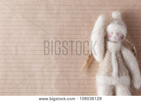 Felt Doll On Background With Space For You Message