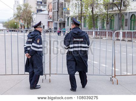 Police Patrol At The Central Street In Summer Day