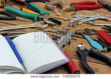 The Book For Records And Tools On A Timber Floor.