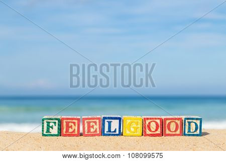 Word Feelgood In Colorful Alphabet Blocks On Tropical Beach