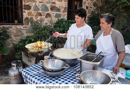 Woman Cooking Delicious  Loukoumades Pastry