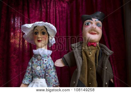 LYON, FRANCE-NOVEMBER 14, 2015:  2 guignols puppets outside to promote a show.  Guignol is the main character in a French puppet show which has come to bear his name. 