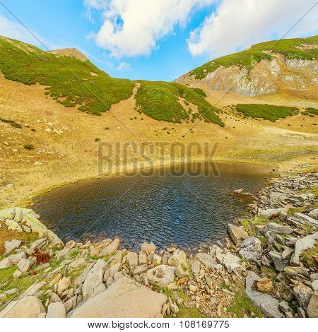 Surface Of The Mountain Lake.