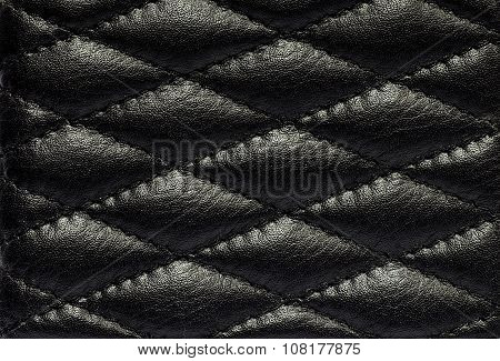 Blank black leather label isolated on white background