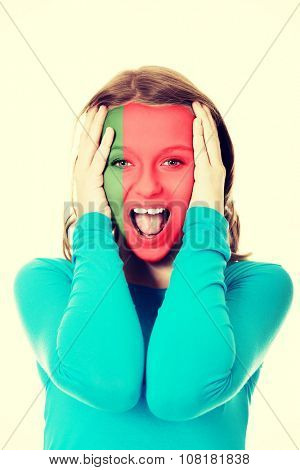 Woman with Portugual flag painted on face.