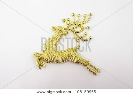 Golden reindear on white background. Christmas. Holiday.