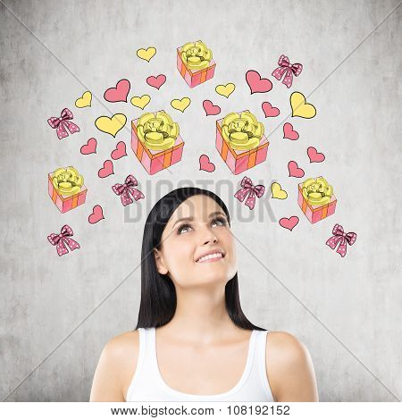 A Brunette Beautiful Woman Is Dreaming About The Gift. Gift And Heart Icons Are Drawn On The Concret