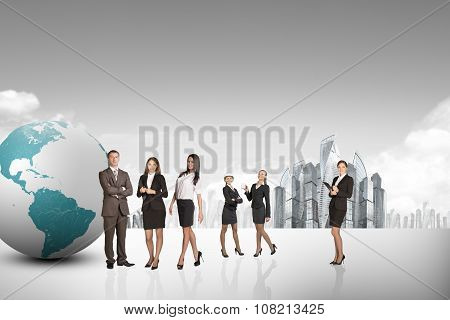 Buisnesspeople with earth globe