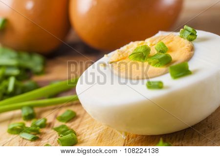 Half Of Boiled Egg  Prepared On Cutting Board