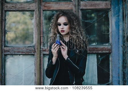 Vintage witch with elixir in hand