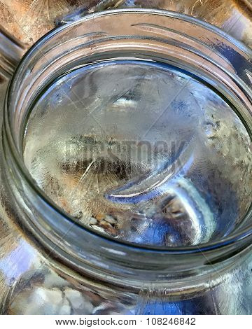 Brittle Crust of Ice in Glass Jar