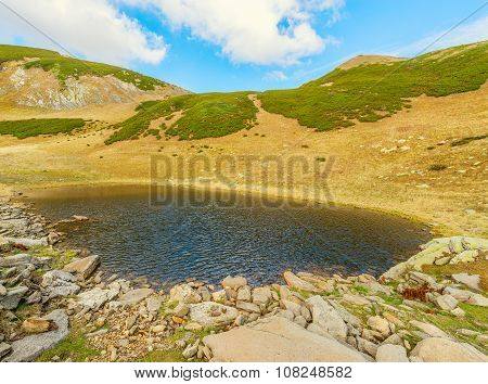 Surface Of The Mountain Lake.