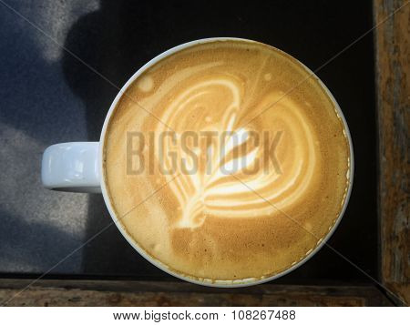 Full Cup of Coffee on the Table