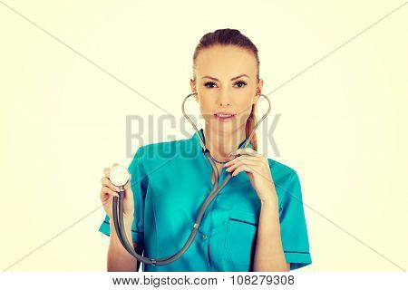 Beautiful smiling caucasian woman doctor with stethoscope.