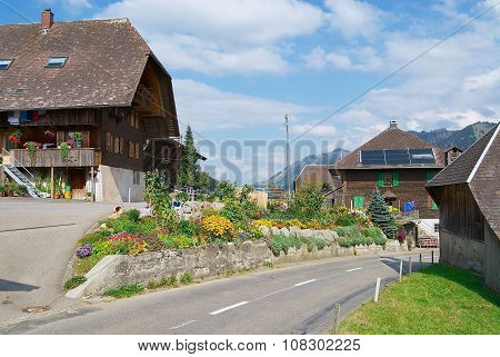 View to the typical countryside houses in Emmental, Switzerland.