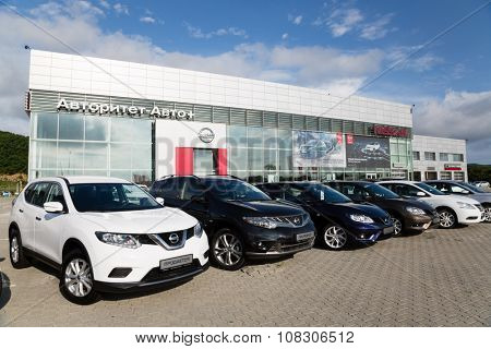 ARTYOM, RUSSIA - CIRCA AUGUST, 2015: Cars at the dealership of Nissan for the city of Vladivostok. Nissan Motor Co., Ltd. - Japanese automaker, one of the largest in the world and the third in Japan.