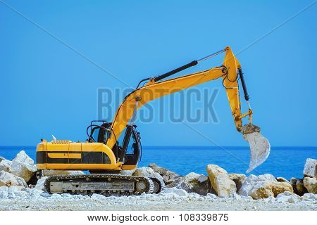 Excavator On The Seaside