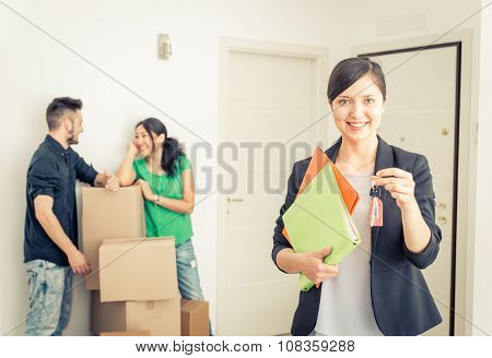 Real Estate Agent Portait With Family Getting New Home